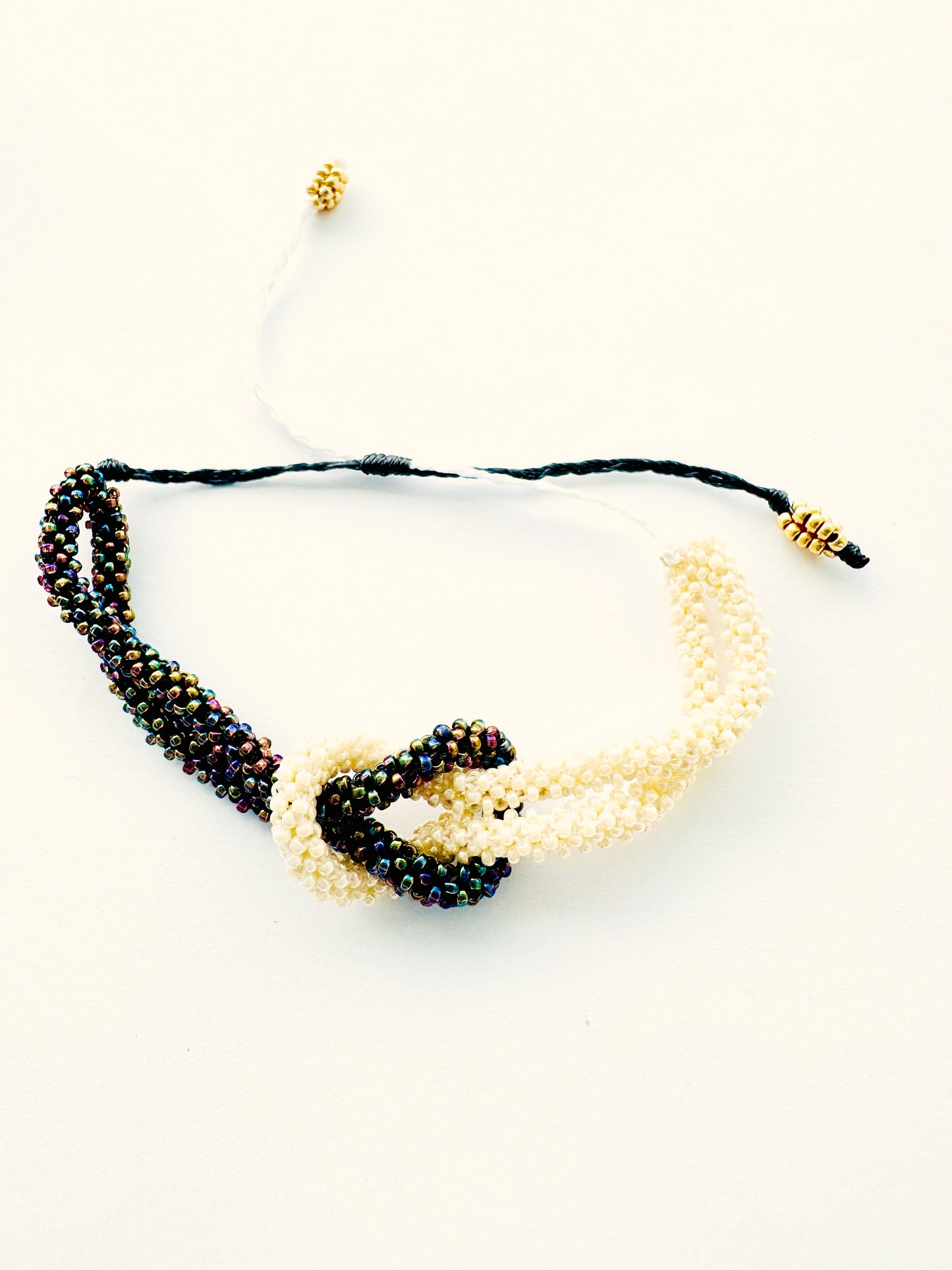 PULSERA LAZO DE MEDIA LUNA