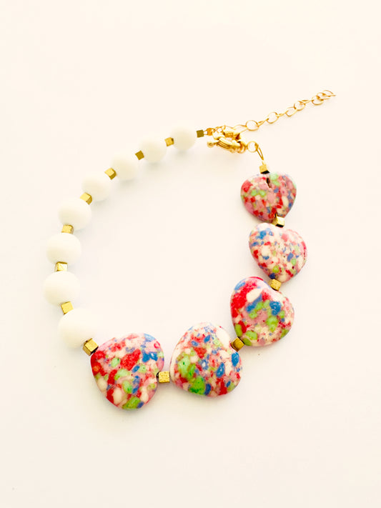 PULSERA CORAZONES CONFETTI
