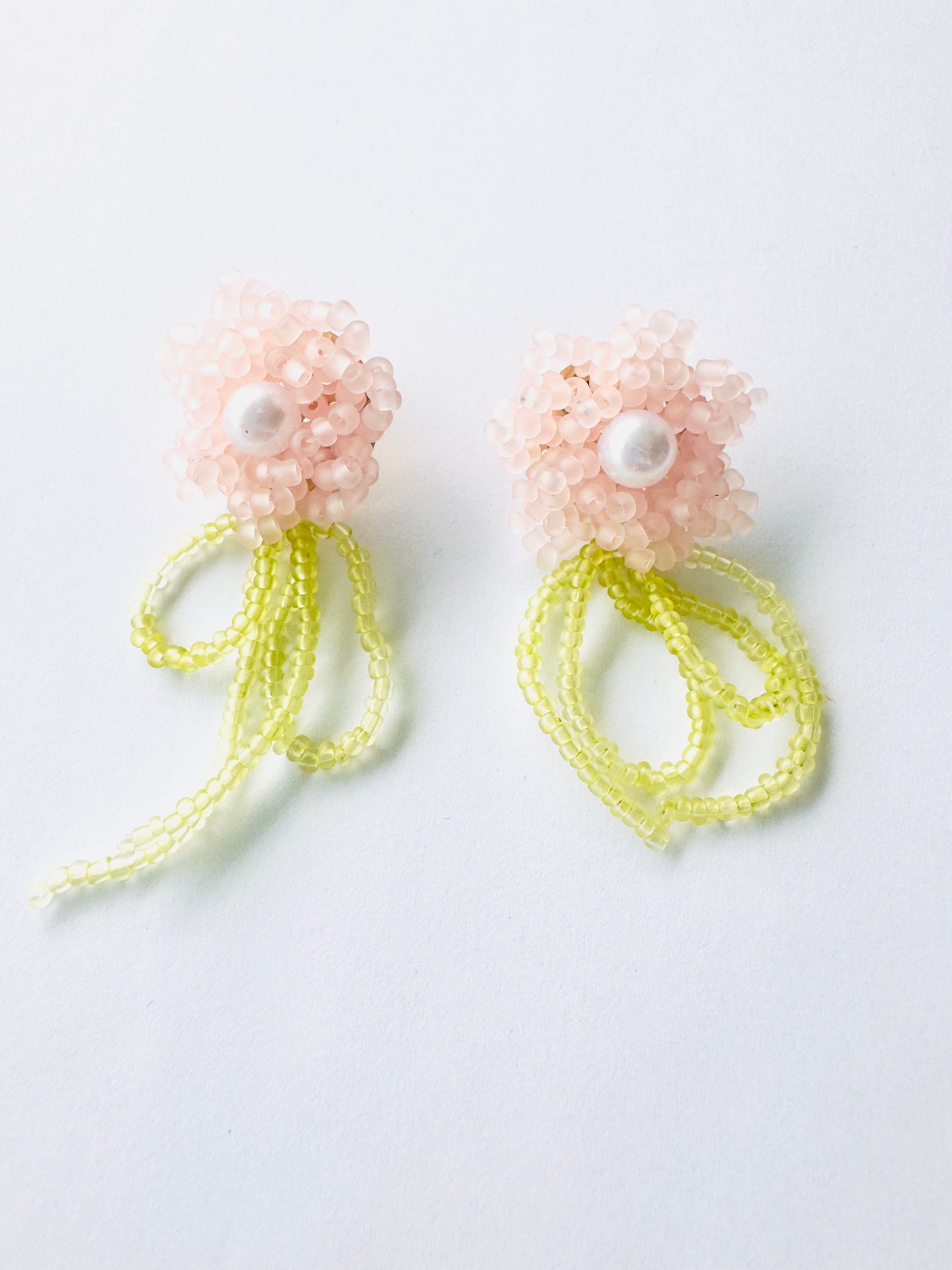 ARETES FLOR AURA