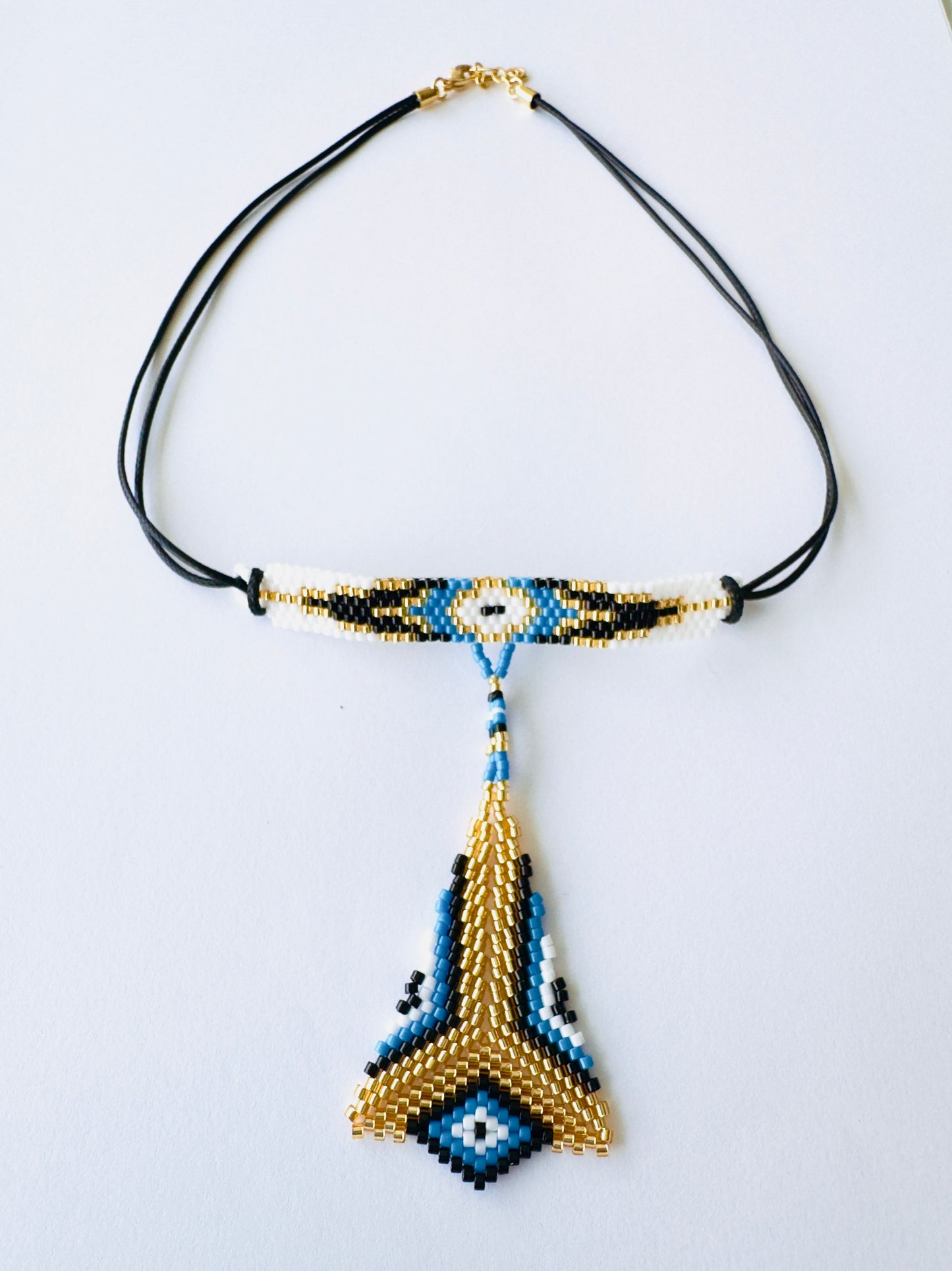 COLLAR OJO DORADO